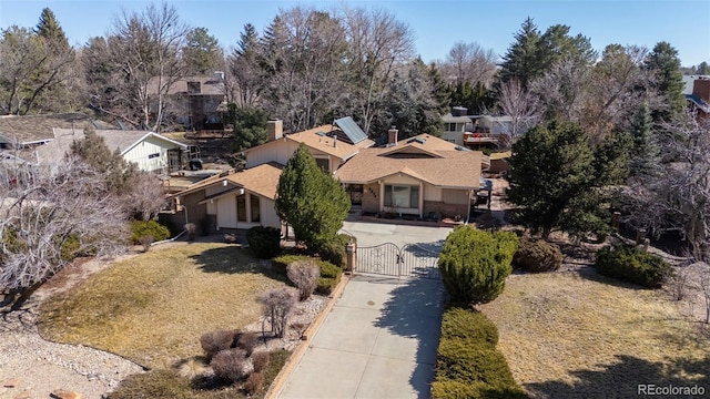 birds eye view of property with a residential view