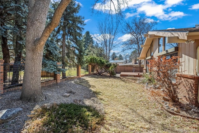 view of yard featuring a fenced backyard