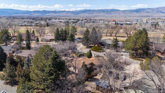 bird's eye view with a residential view and a mountain view