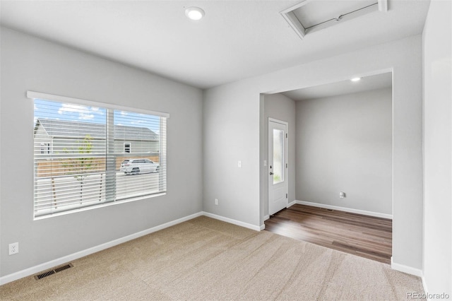 973 Cascade Falls St, Severance, CO 80550 - unfurnished room with attic access, carpet floors, and baseboards