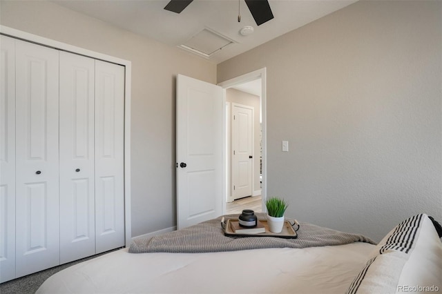 bedroom featuring a closet and ceiling fan