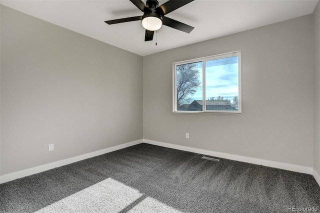 unfurnished room with carpet and ceiling fan