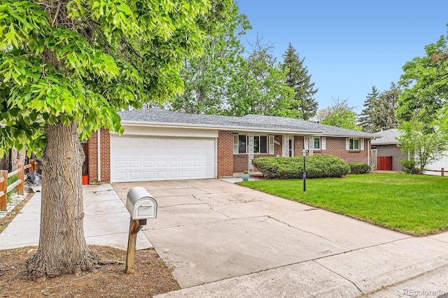 13558 E Center Ave, Aurora, CO 80012 - single story home with an attached garage, driveway, and brick siding