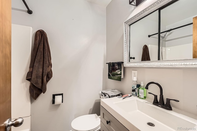 13558 E Center Ave, Aurora, CO 80012 - full bath featuring toilet, vanity, and a shower