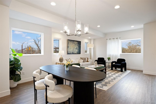 8410 W 52nd Ave, Arvada, CO 80002 - dining area with a chandelier, wood finished floors, baseboards, and recessed lighting