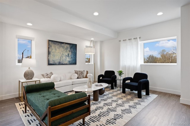 8410 W 52nd Ave, Arvada, CO 80002 - living area with baseboards, wood finished floors, and recessed lighting