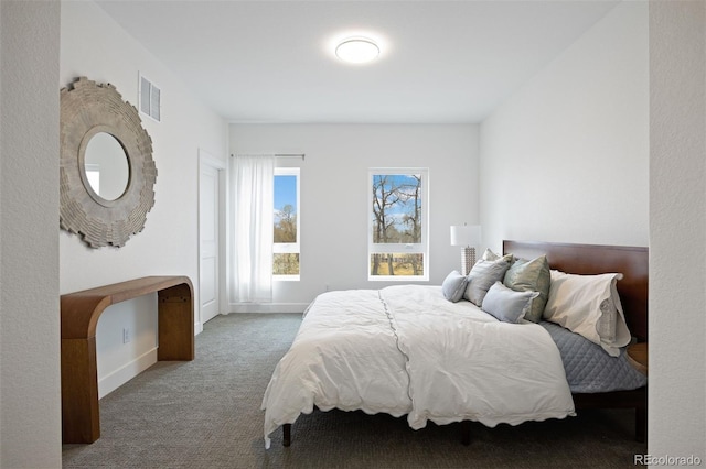 8410 W 52nd Ave, Arvada, CO 80002 - carpeted bedroom featuring baseboards