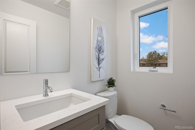 8410 W 52nd Ave, Arvada, CO 80002 - bathroom with vanity and toilet