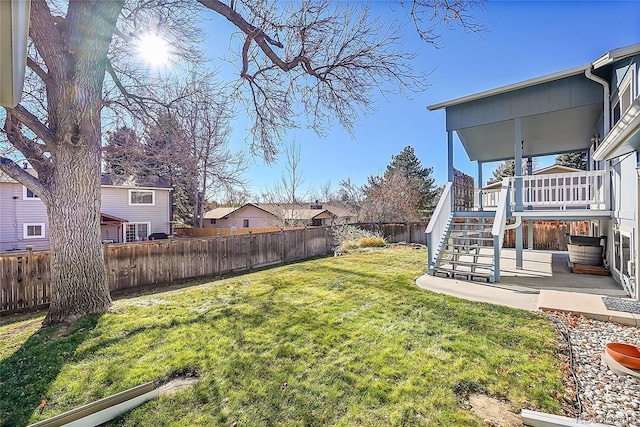 view of yard with a patio area and a deck