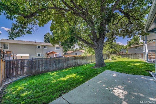 8160 W 81st Pl, Arvada, CO 80005 - fenced backyard featuring a patio