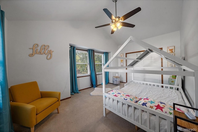 carpeted bedroom with high vaulted ceiling and ceiling fan