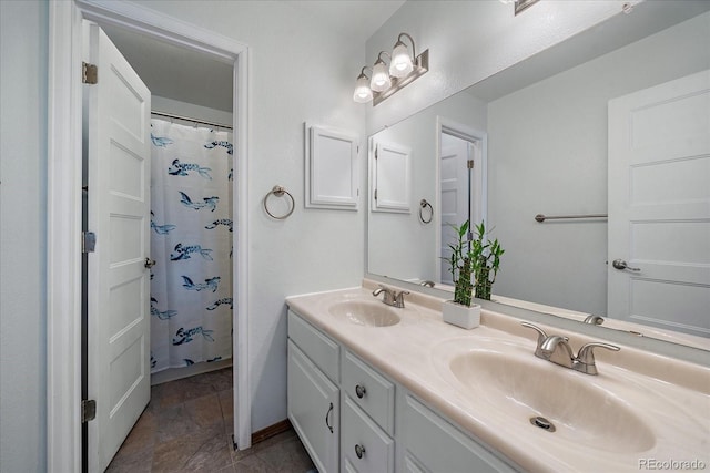 bathroom featuring vanity and a shower with curtain