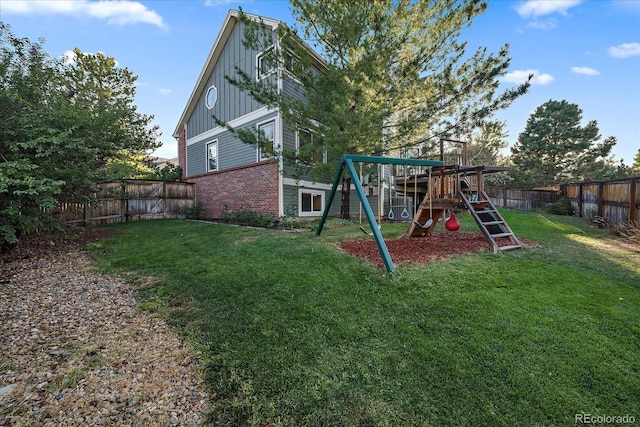 view of play area featuring a yard