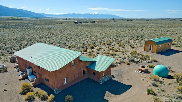 drone / aerial view with a mountain view