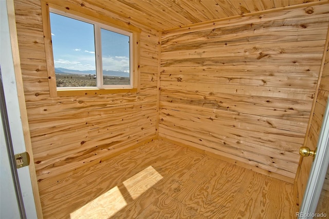 spare room with wood ceiling