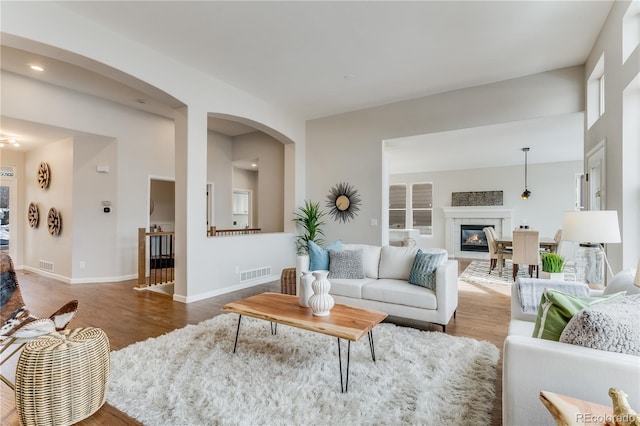 living room with dark wood-type flooring