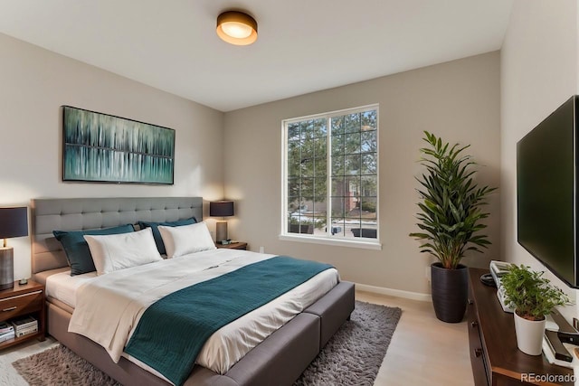 bedroom featuring light hardwood / wood-style floors