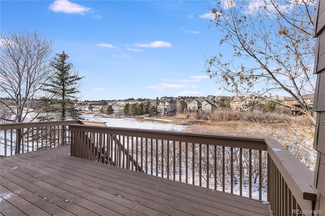 view of snow covered deck