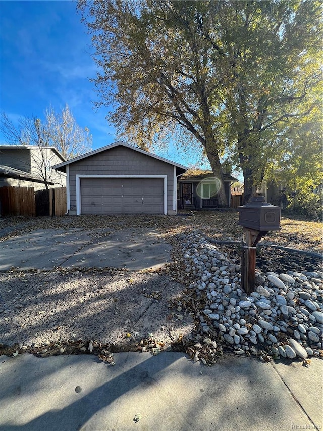 view of side of property with a garage