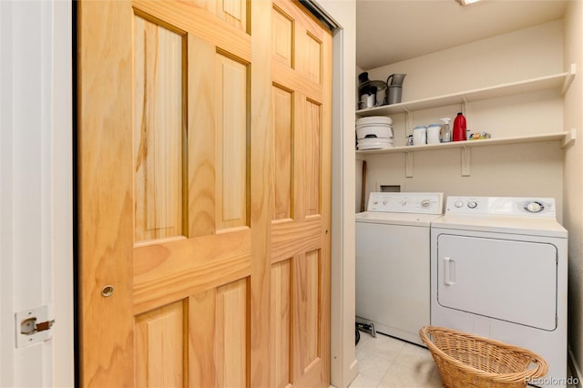 laundry area with independent washer and dryer