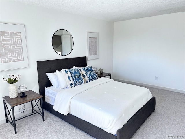 4382 S Xenon St, Morrison, CO 80465 - bedroom featuring carpet flooring and a textured ceiling