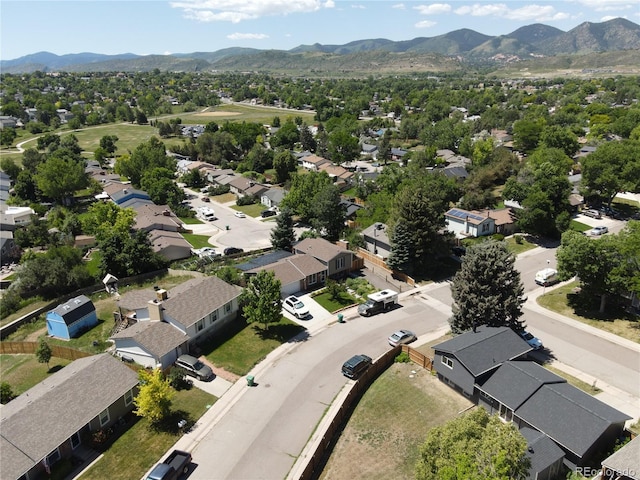 4382 S Xenon St, Morrison, CO 80465 - aerial perspective of suburban area with a mountain backdrop