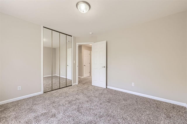 2552 E 126th Way, Thornton, CO 80241 - unfurnished bedroom with carpet floors, baseboards, and a closet