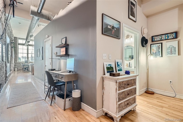 hallway featuring hardwood / wood-style flooring