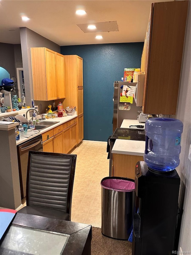 kitchen featuring appliances with stainless steel finishes and sink