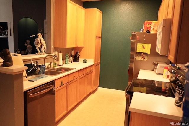 kitchen featuring dishwashing machine, white microwave, a sink, light countertops, and electric stove