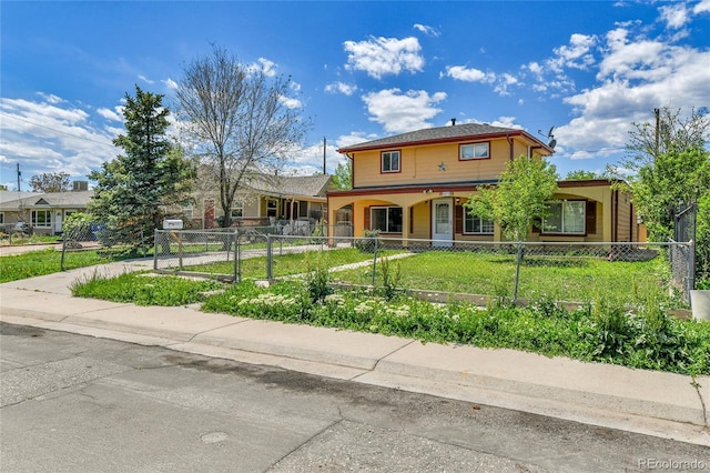 6671 Grove St, Denver, CO 80221 - view of front facade featuring a porch, a fenced front yard, and a gate