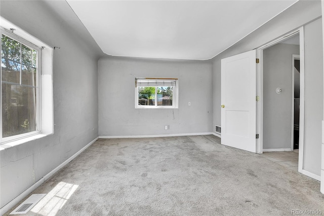 6671 Grove St, Denver, CO 80221 - carpeted empty room with plenty of natural light