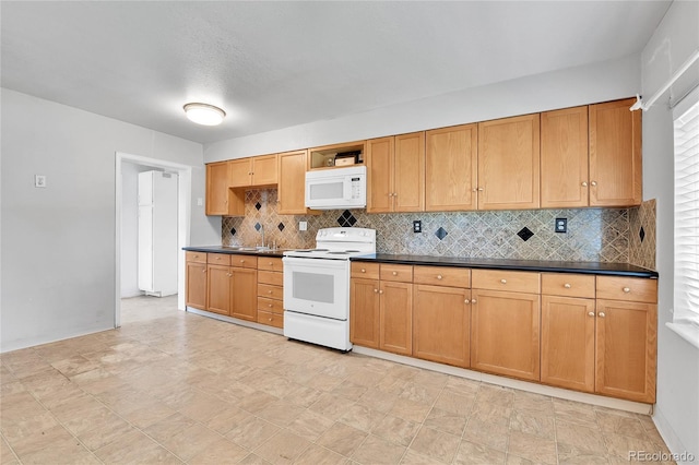 6671 Grove St, Denver, CO 80221 - kitchen featuring white appliances, decorative backsplash, dark countertops, and open shelves