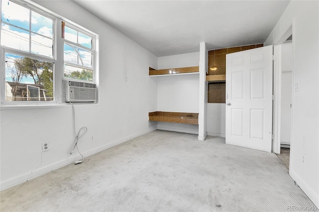 6671 Grove St, Denver, CO 80221 - unfurnished bedroom featuring light colored carpet, baseboards, and cooling unit