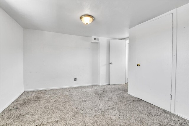 6671 Grove St, Denver, CO 80221 - empty room featuring carpet floors and baseboards