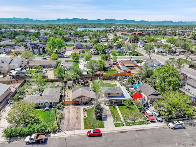 6671 Grove St, Denver, CO 80221 - aerial perspective of suburban area featuring mountains