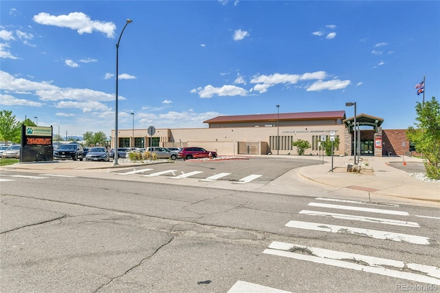6671 Grove St, Denver, CO 80221 - view of asphalt street featuring street lights, sidewalks, and curbs