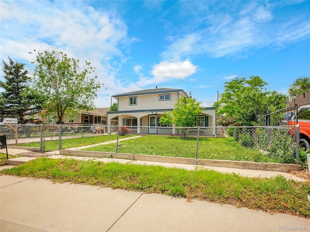 6671 Grove St, Denver, CO 80221 - view of front facade featuring a fenced front yard and a gate