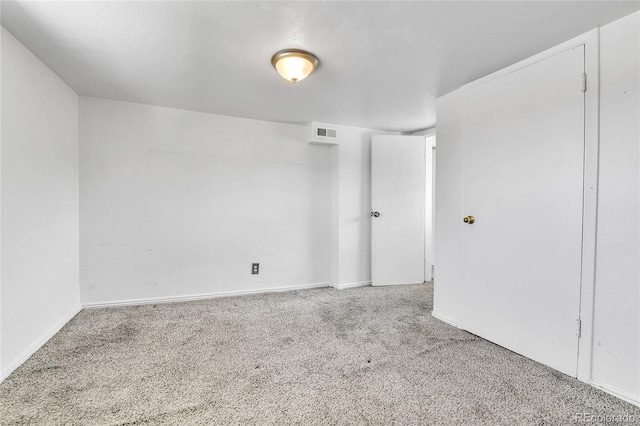6671 Grove St, Denver, CO 80221 - carpeted empty room with baseboards