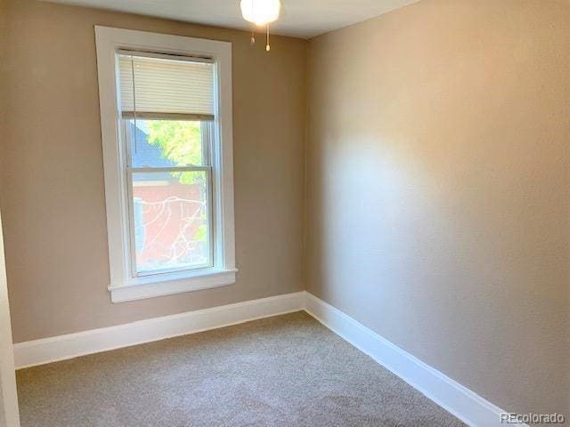 view of carpeted spare room