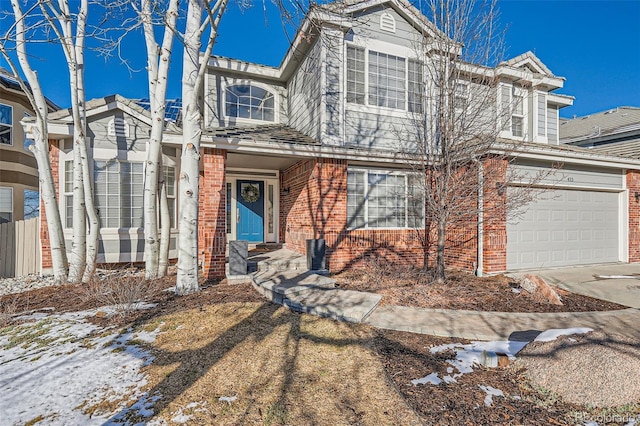 view of front of property with a garage