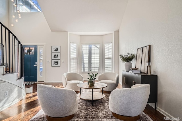 living area with hardwood / wood-style floors