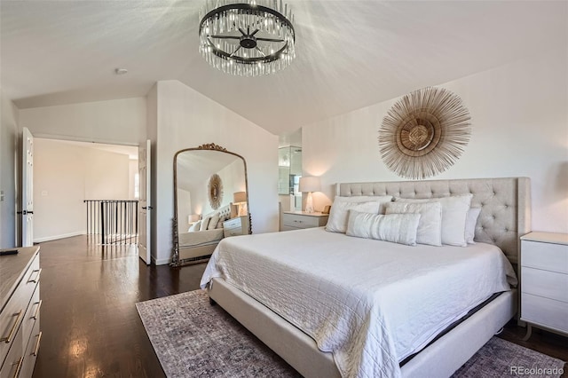 bedroom with lofted ceiling and dark hardwood / wood-style floors