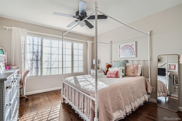 bedroom featuring multiple windows, ceiling fan, and dark hardwood / wood-style floors