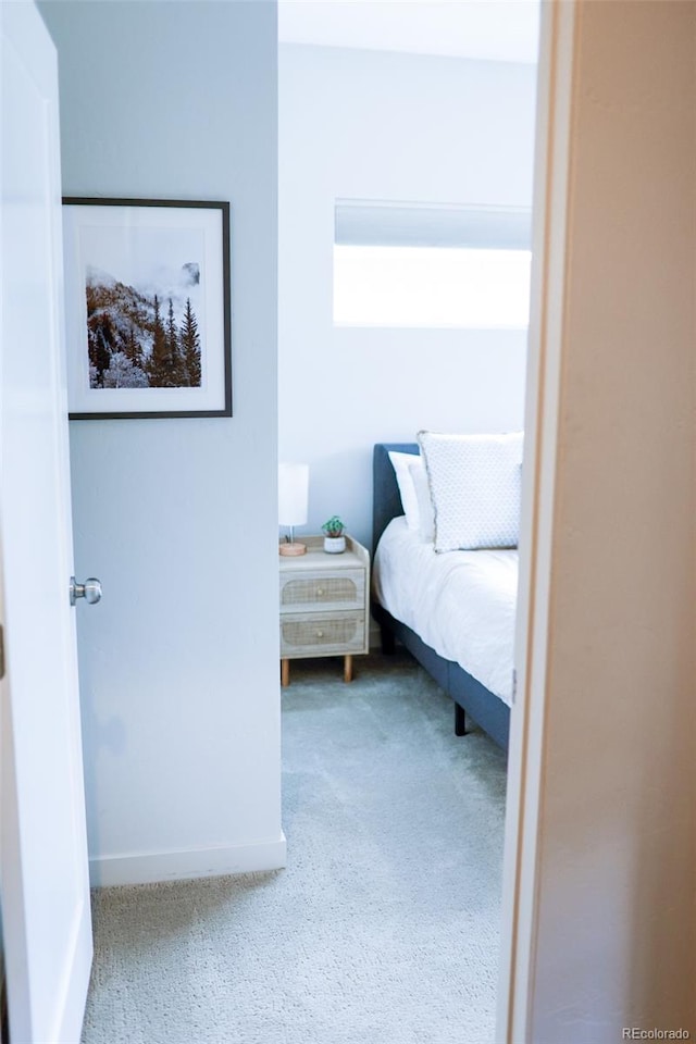 bedroom featuring carpet flooring