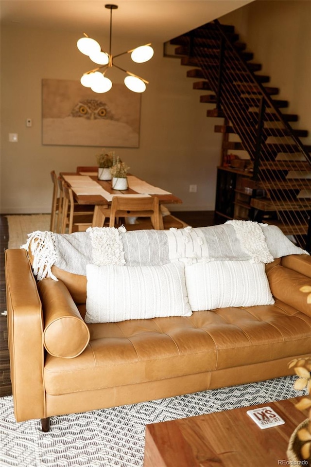 living room featuring an inviting chandelier