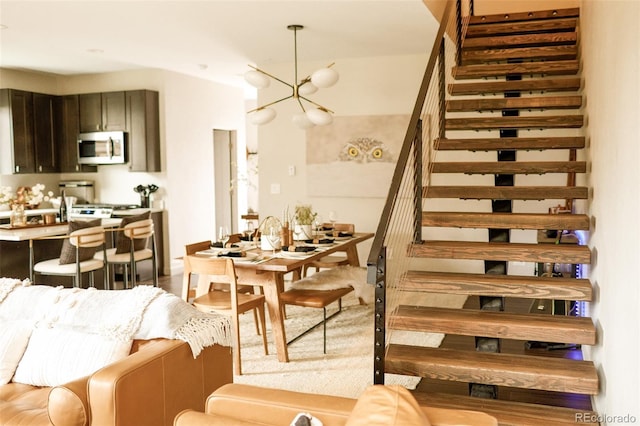 dining area with a chandelier and hardwood / wood-style floors