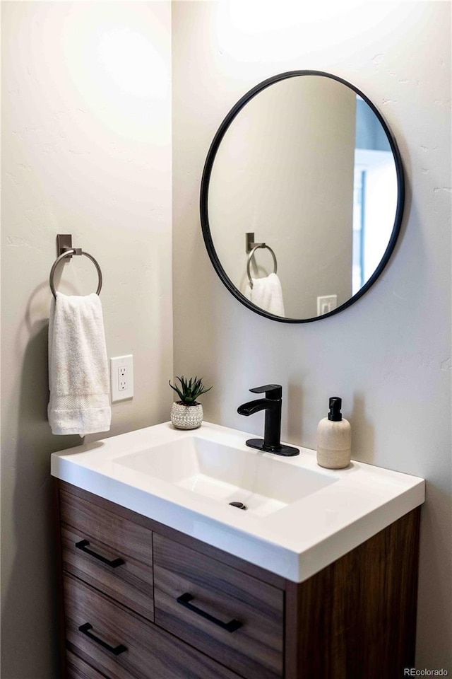 bathroom featuring vanity