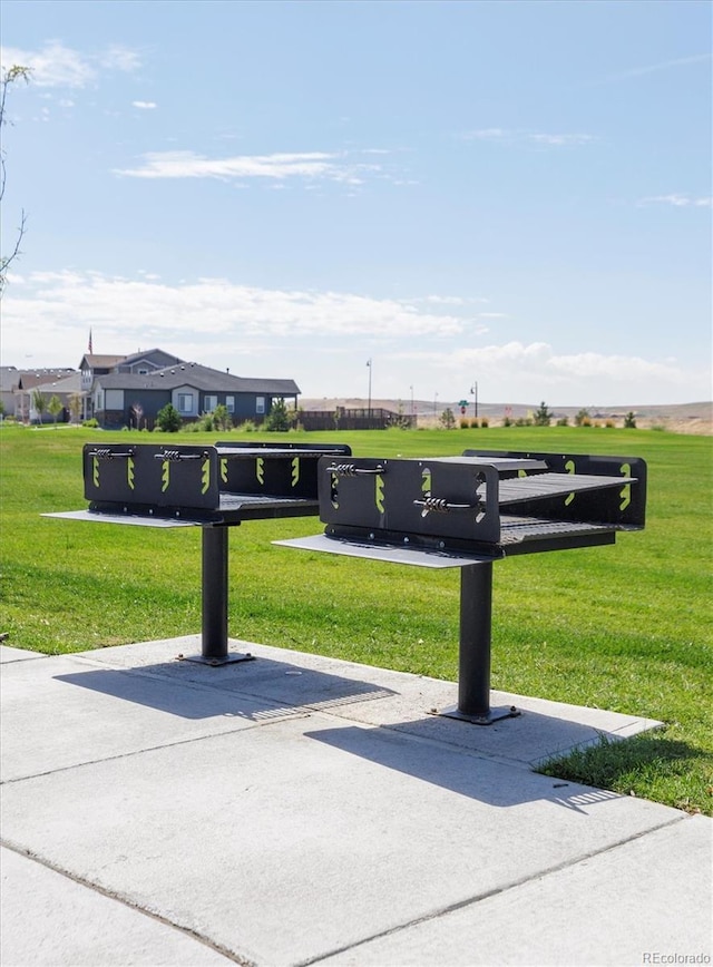 surrounding community with a lawn