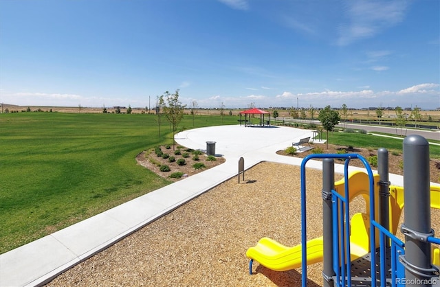 view of community with a lawn, a gazebo, and playground community